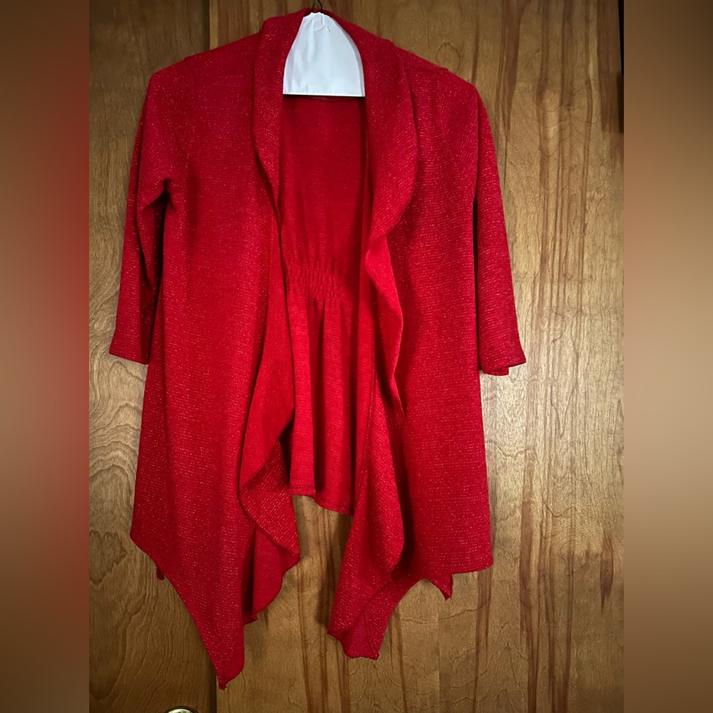 Red sparkly sweater jacket. Perfect over a short sleeve top